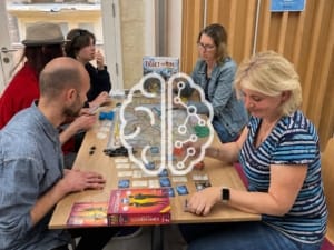 Players using critical thinking and decision-making during a board game