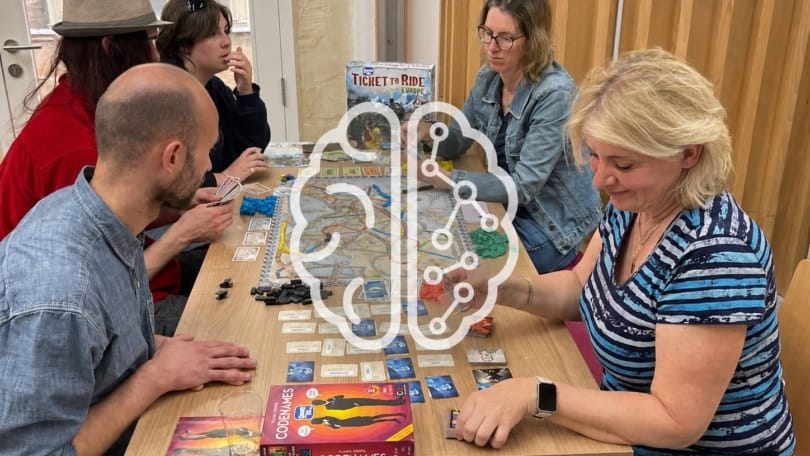 Players using critical thinking and decision-making during a board game