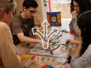 Young people considering their next move during a strategy board game