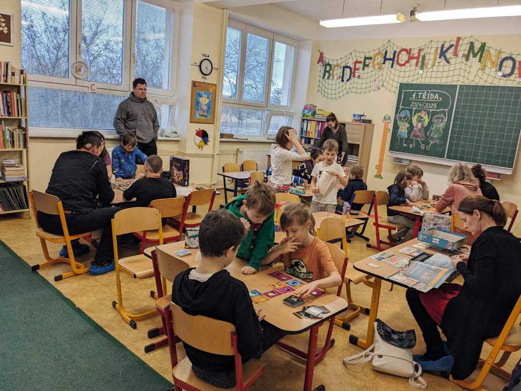 Children playing board games during a Game On session at Chraštice Primary School in Czechia.